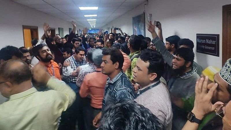 Aggrieved officials and employees of the Bangladesh Bank protest on 7 August 2024